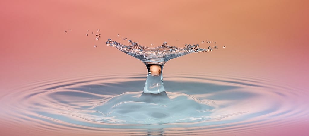 photo of a water drop creating an impact, placed to emphasize the impact of corporate social responsibility guidelines