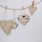 Eco Friendly Banner with 4 Brown Hearts on a String