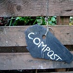 chalkboard sign indicating compost