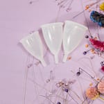 clear menstruation cups on purple background
