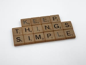 scrabble pieces spelling out keep things simple to show our approach to sustainable decluttering