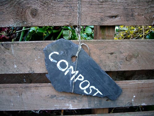 chalkboard sign indicating compost