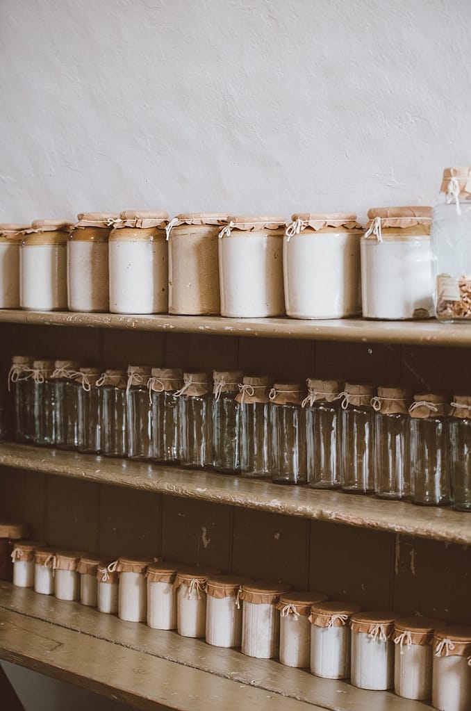 minimalist, zero-waste glass jars on a shelf
