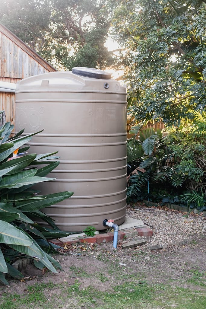 large metal rainwater harvest cistern conserving water